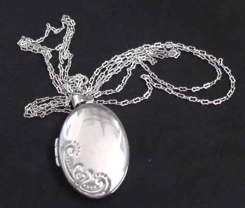 Large silver locket with - with, s/p