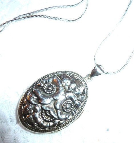 Large embossed silver locket - large,
