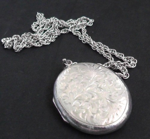 Large silver locket with - silver,
